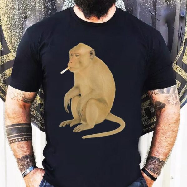 Playful primate puffing on a cigarette graphic tshirt