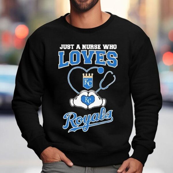 Royals fan nurse shows team spirit with heart hands t-shirt